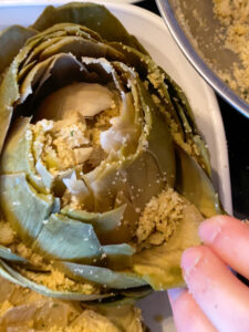 Artichokes are super healthy so they can be a great addition or star of any dinner! This recipe fills the hearty artichokes with a delicious blend of flavors and spices. They're stuffed with breadcrumbs, onions, garlic, parmesan cheese and more!